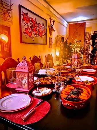 Moroccan tagine and festive dishes served for Christmas dinner in a Moroccan riad.