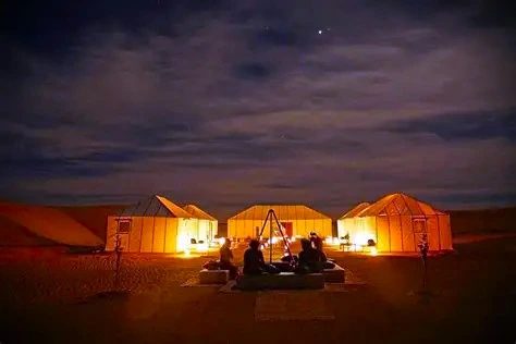 Celebrate New Year celebrations in a Morocco luxury desert camp surrounded by golden dunes, gourmet dinners, Berber music, and starlit skies. Discover an authentic and luxurious Sahara experience to welcome the new year in unforgettable style.